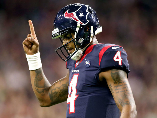 HOUSTON, TEXAS - JANUARY 04: Deshaun Watson #4 of the Houston Texans celebrates a touchdown pass against the Buffalo Bills during the fourth quarter of the AFC Wild Card Playoff game at NRG Stadium on January 04, 2020 in Houston, Texas.
