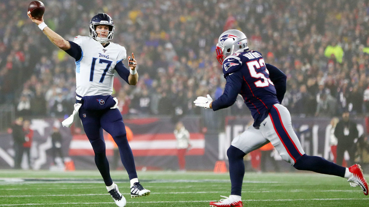 FOXBOROUGH, MASSACHUSETTS - JANUARY 04: Ryan Tannehill #17 of the Tennessee Titans throws a pass against Kyle Van Noy #53 of the New England Patriots in the first half of the AFC Wild Card Playoff game at Gillette Stadium on January 04, 2020 in Foxborough, Massachusetts.