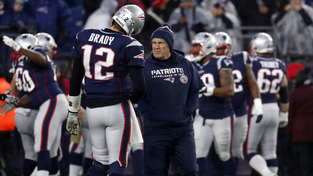 FOXBOROUGH, MA - NOVEMBER 24: New England Patriots head coach Bill Belichick listens to New England Patriots quarterback Tom Brady (12) during warm up before a game between the New England Patriots and the Dallas Cowboys on November 24, 2019, at Gillette Stadium in Foxborough, Massachusetts.