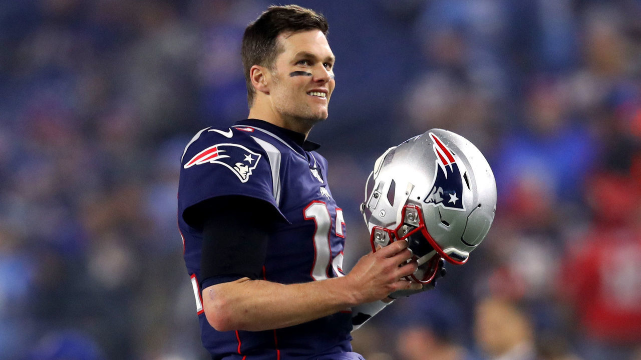 FOXBOROUGH, MASSACHUSETTS - JANUARY 04: Tom Brady #12 of the New England Patriots smiles before the AFC Wild Card Playoff game against the Tennessee Titans at Gillette Stadium on January 04, 2020 in Foxborough, Massachusetts.