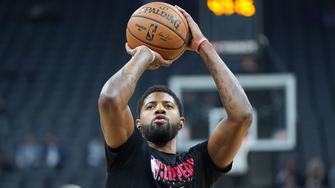 SACRAMENTO, CALIFORNIA - DECEMBER 31: Paul George #13 of the LA Clippers warms up prior to the start of an NBA basketball game against the Sacramento Kings at Golden 1 Center on December 31, 2019 in Sacramento, California.