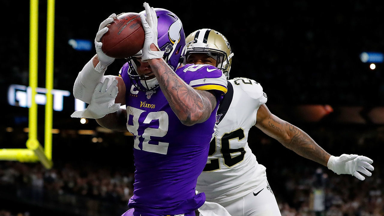 NEW ORLEANS, LOUISIANA - JANUARY 05: Kyle Rudolph #82 of the Minnesota Vikings makes the game-winning touchdown reception against P.J. Williams #26 of the New Orleans Saints during overtime in the NFC Wild Card Playoff game at Mercedes Benz Superdome on January 05, 2020 in New Orleans, Louisiana.