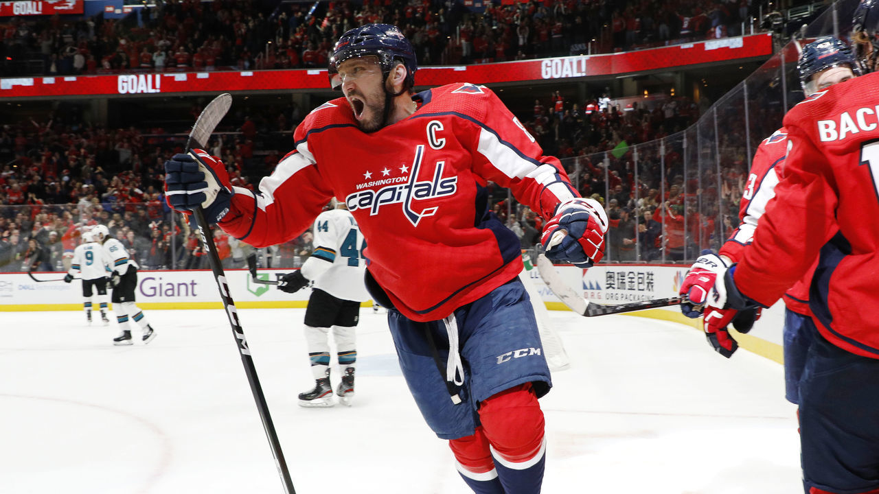 WASHINGTON, DC - JANUARY 05: Alex Ovechkin #8 of the Washington Capitals celebrates after teammate T.J. Oshie #77 scored a goal in the third period against the San Jose Sharks at Capital One Arena on January 5, 2020 in Washington, DC.