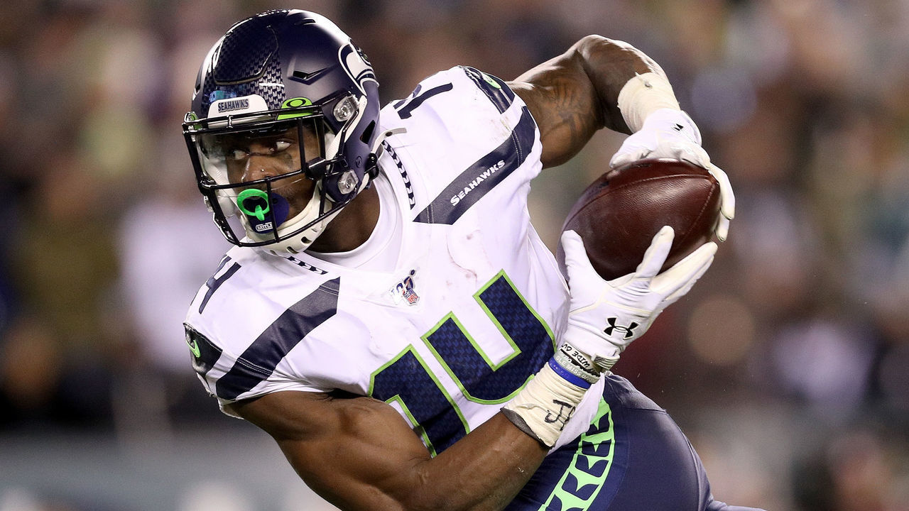 PHILADELPHIA, PENNSYLVANIA - JANUARY 05: D.K. Metcalf #14 of the Seattle Seahawks makes a reception for a touchdown against the Philadelphia Eagles in the third quarter during their NFC Wild Card Playoff game at Lincoln Financial Field on January 05, 2020 in Philadelphia, Pennsylvania.
