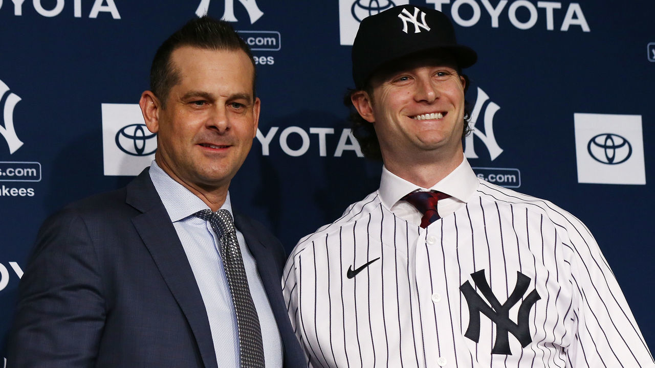 NEW YORK, NEW YORK - DECEMBER 18: Gerrit Cole and Manager, Aaron Boone of the New York Yankees pose for a photo at Yankee Stadium during a press conference at Yankee Stadium on December 18, 2019 in New York City.