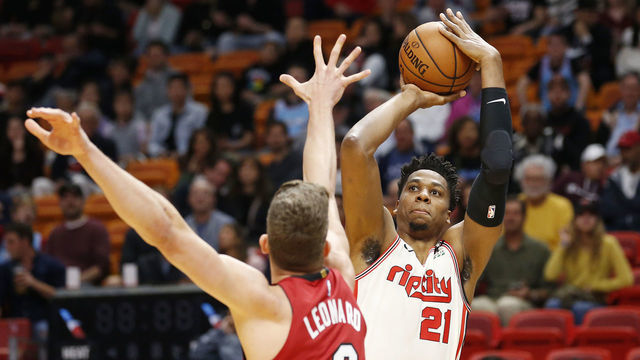 MIAMI, FLORIDA - JANUARY 05: Hassan Whiteside #21 of the Portland Trail Blazers shoots over Meyers Leonard #0 of the Miami Heat during the first half at American Airlines Arena on January 05, 2020 in Miami, Florida. NOTE TO USER: User expressly acknowledges and agrees that, by downloading and/or using this photograph, user is consenting to the terms and conditions of the Getty Images License Agreement.