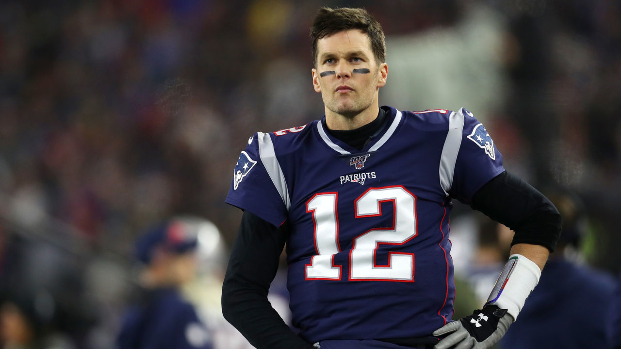 FOXBOROUGH, MASSACHUSETTS - JANUARY 04: Tom Brady #12 of the New England Patriots looks on during the the AFC Wild Card Playoff game against the Tennessee Titans at Gillette Stadium on January 04, 2020 in Foxborough, Massachusetts.