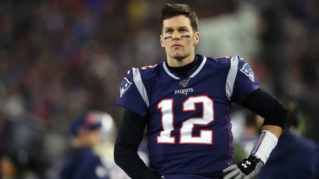 FOXBOROUGH, MASSACHUSETTS - JANUARY 04: Tom Brady #12 of the New England Patriots looks on during the the AFC Wild Card Playoff game against the Tennessee Titans at Gillette Stadium on January 04, 2020 in Foxborough, Massachusetts.