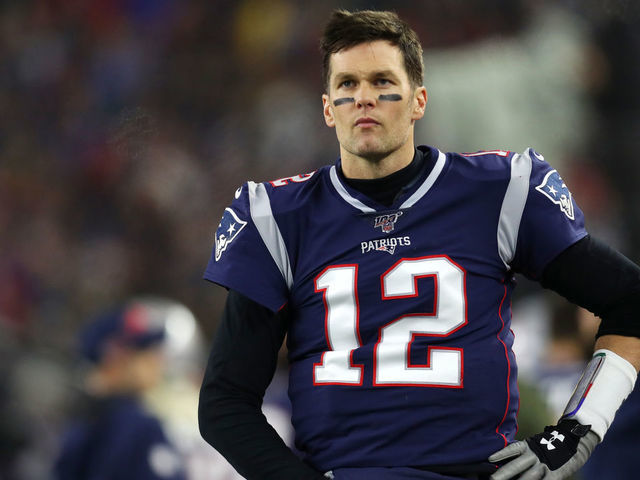 FOXBOROUGH, MASSACHUSETTS - JANUARY 04: Tom Brady #12 of the New England Patriots looks on during the the AFC Wild Card Playoff game against the Tennessee Titans at Gillette Stadium on January 04, 2020 in Foxborough, Massachusetts.