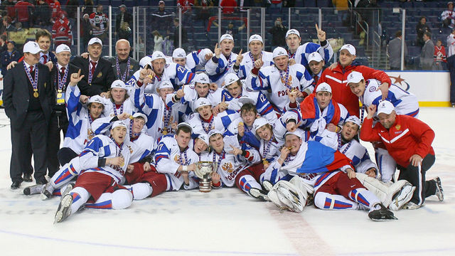 BUFFALO, NY - JANUARY 05: Members of Team Russia pose with the IIHF World Junior Trophy after defeating Canada 5-3 during the 2011 IIHF World U20 Championship Gold medal game between Canada and Russia at the HSBC Arena on January 5, 2011 in Buffalo, New York.