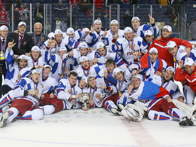 BUFFALO, NY - JANUARY 05: Members of Team Russia pose with the IIHF World Junior Trophy after defeating Canada 5-3 during the 2011 IIHF World U20 Championship Gold medal game between Canada and Russia at the HSBC Arena on January 5, 2011 in Buffalo, New York.