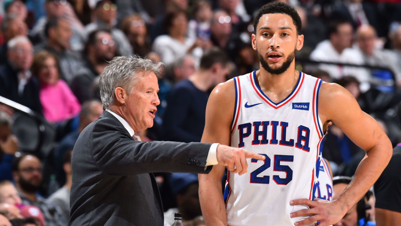 PHILADELPHIA, PA - DECEMBER 8: Head Coach Brett Brown and Ben Simmons #25 of the Philadelphia 76ers talk during a game against the Toronto Raptors on December 8, 2019 at the Wells Fargo Center in Philadelphia, Pennsylvania NOTE TO USER: User expressly acknowledges and agrees that, by downloading and/or using this Photograph, user is consenting to the terms and conditions of the Getty Images License Agreement. Mandatory Copyright Notice: Copyright 2019 NBAE
