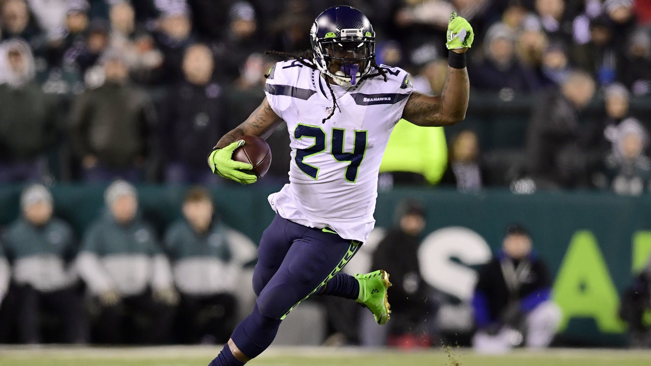 PHILADELPHIA, PENNSYLVANIA - JANUARY 05: Marshawn Lynch #24 of the Seattle Seahawks carries the ball for a first down in the third quarter of the NFC Wild Card Playoff game against the Philadelphia Eagles at Lincoln Financial Field on January 05, 2020 in Philadelphia, Pennsylvania.