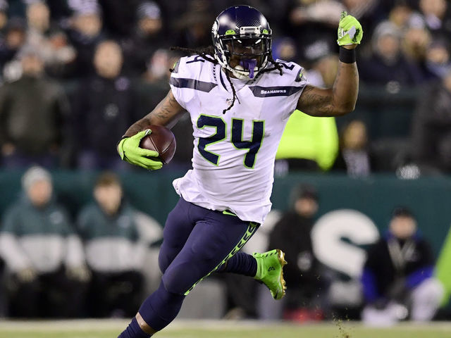 PHILADELPHIA, PENNSYLVANIA - JANUARY 05: Marshawn Lynch #24 of the Seattle Seahawks carries the ball for a first down in the third quarter of the NFC Wild Card Playoff game against the Philadelphia Eagles at Lincoln Financial Field on January 05, 2020 in Philadelphia, Pennsylvania.