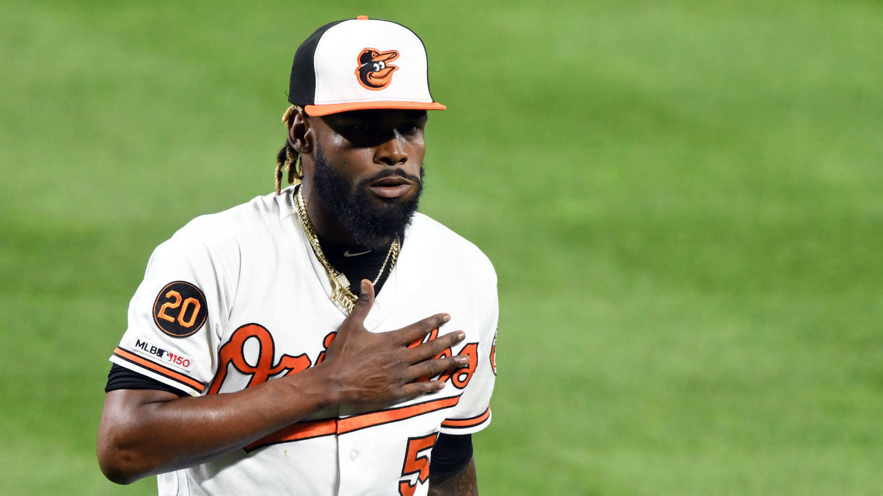 BALTIMORE, MD - SEPTEMBER 17: Miguel Castro #50 of the Baltimore Orioles walks back to the dug out during a baseball game against the Toronto Blue Jays at Oriole Park at Camden Yards on September 17, 2019 in Baltimore, Maryland.