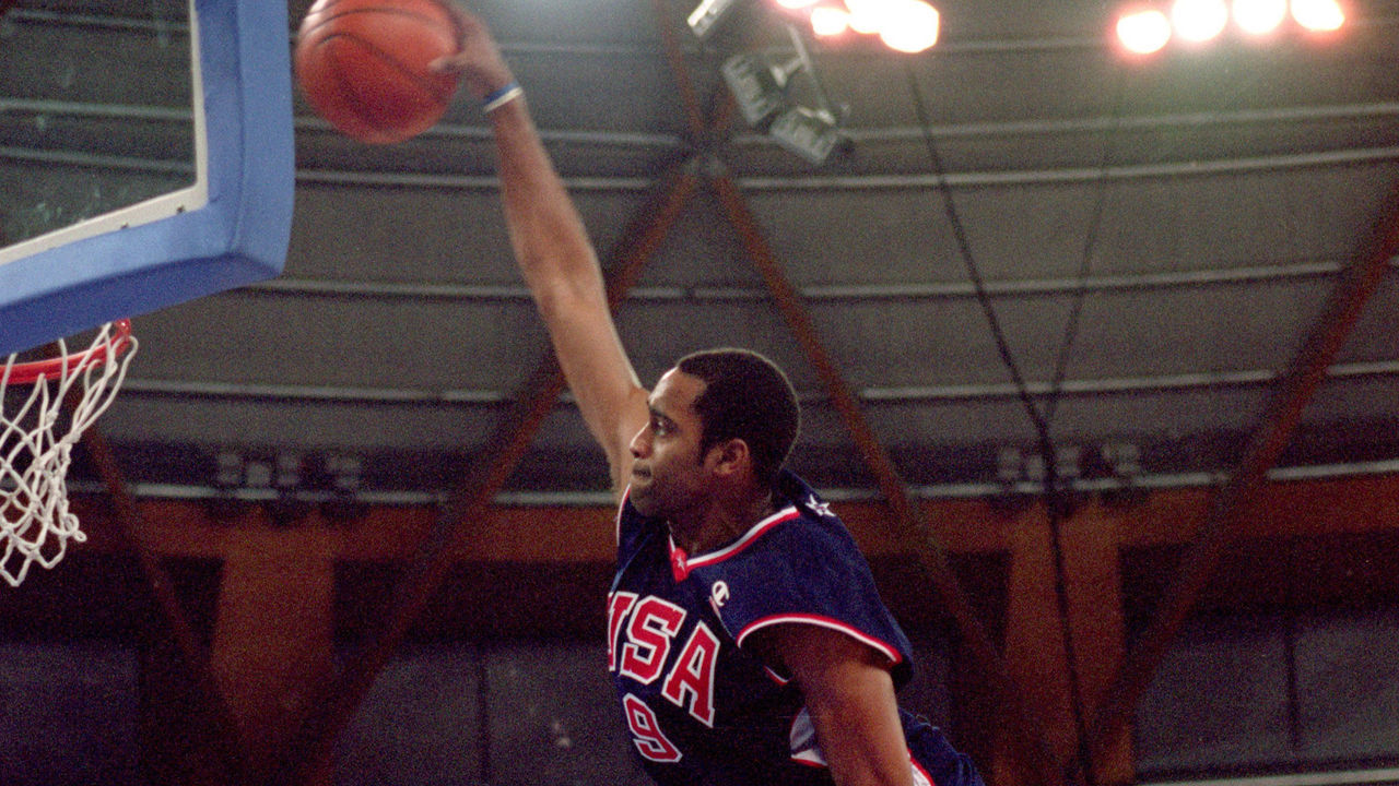 25 Sep 2000: Vince Carter of the USA leaps over Frederic Weis of France to dunk during the Mens Basketball Preliminaries at the Dome in the Olympic Park on Day 10 of the Sydney 2000 Olympic Games in Sydney, Australia. \ Mandatory Credit: Darren McNamara/Allsport
