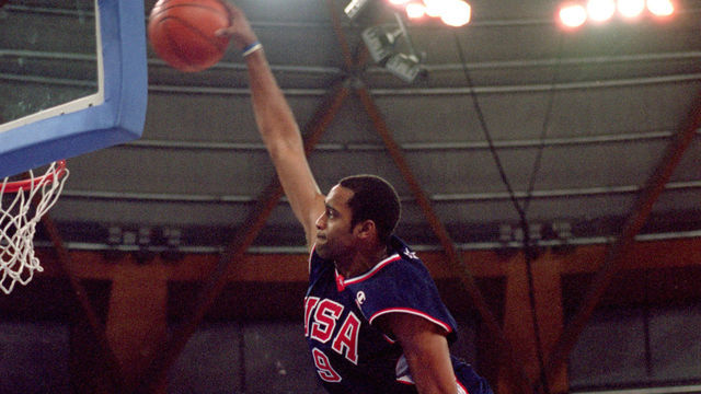 25 Sep 2000: Vince Carter of the USA leaps over Frederic Weis of France to dunk during the Mens Basketball Preliminaries at the Dome in the Olympic Park on Day 10 of the Sydney 2000 Olympic Games in Sydney, Australia. \ Mandatory Credit: Darren McNamara/Allsport