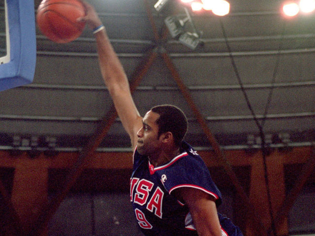 25 Sep 2000: Vince Carter of the USA leaps over Frederic Weis of France to dunk during the Mens Basketball Preliminaries at the Dome in the Olympic Park on Day 10 of the Sydney 2000 Olympic Games in Sydney, Australia. \ Mandatory Credit: Darren McNamara/Allsport