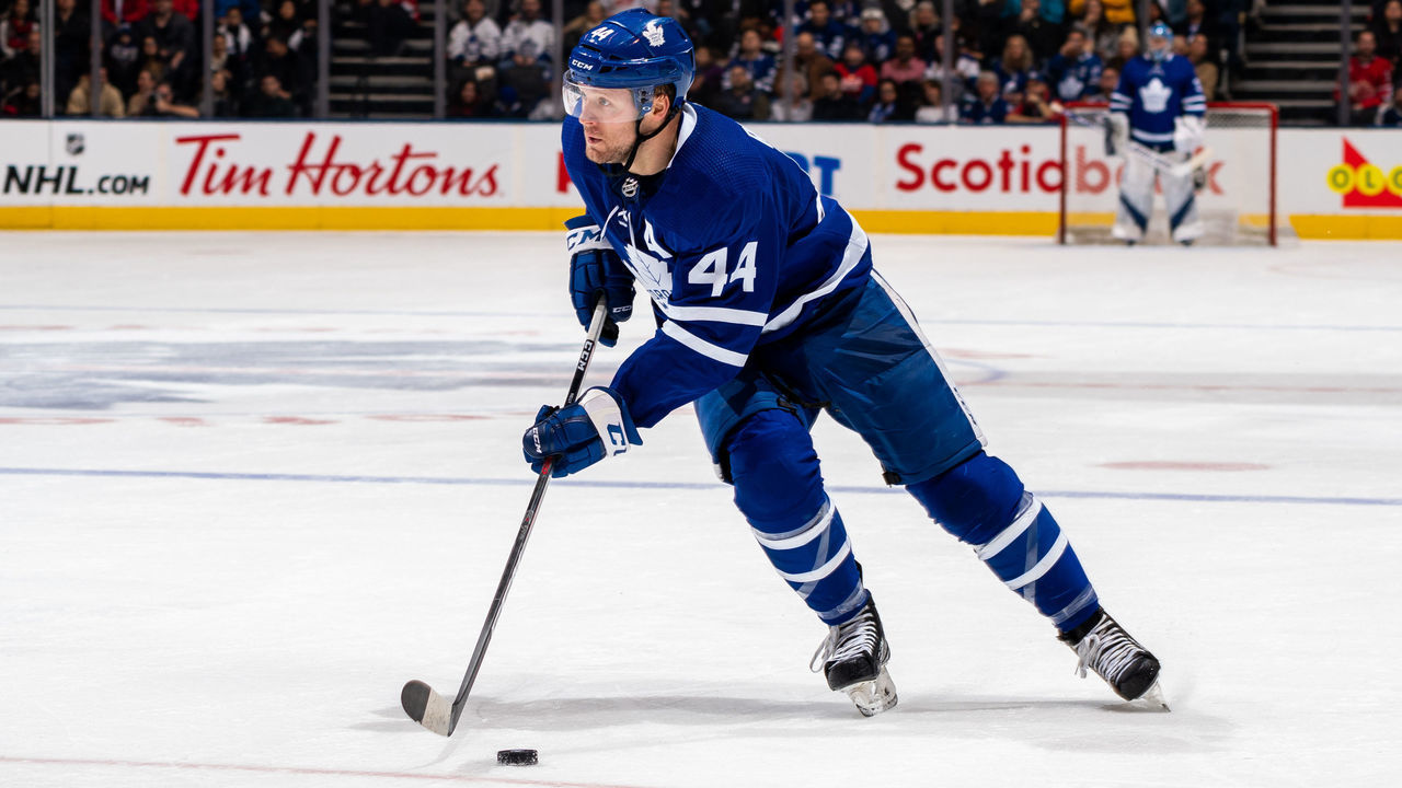 TORONTO, ON - DECEMBER 28: Morgan Rielly #44 of the Toronto Maple Leafs skates with the puck against the New York Rangers during the second period at the Scotiabank Arena on December 28, 2019 in Toronto, Ontario, Canada.