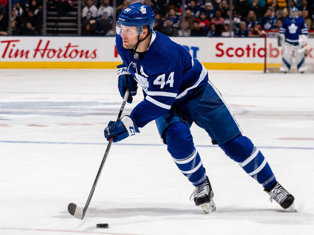 TORONTO, ON - DECEMBER 28: Morgan Rielly #44 of the Toronto Maple Leafs skates with the puck against the New York Rangers during the second period at the Scotiabank Arena on December 28, 2019 in Toronto, Ontario, Canada.