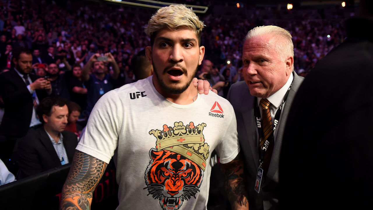 LAS VEGAS, CA - OCTOBER 06: Conor McGregor coach McGregor coach Dillon Danis is escorted out of the arena after Khabib Nurmagomedov attacked him. Nurmagomedov went after Danis after beating Conor McGregor during their fight at UFC 229 at the T-Mobile Arena in Las Vegas, Nev. Friday, Oct. 6, 2018.