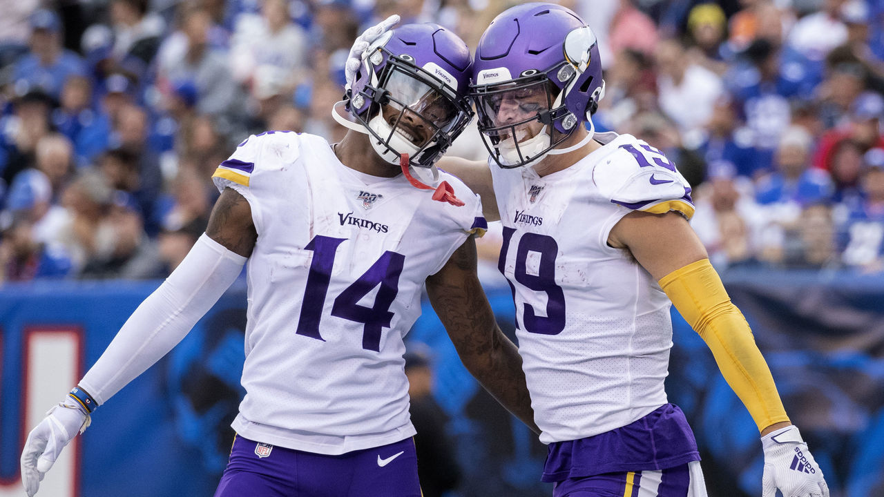 EAST RUTHERFORD, NJ - OCTOBER 6: Minnesota Vikings receiver Adam Thielen (19) celebrated with Stefon Diggs (14) after a touchdown in the third quarter against the New York Giants during an NFL football game at MetLife Stadium in East Rutherford, New Jersey.