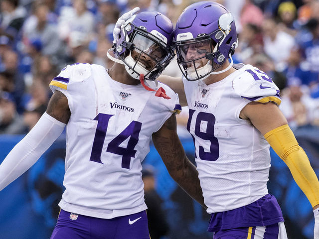 EAST RUTHERFORD, NJ - OCTOBER 6: Minnesota Vikings receiver Adam Thielen (19) celebrated with Stefon Diggs (14) after a touchdown in the third quarter against the New York Giants during an NFL football game at MetLife Stadium in East Rutherford, New Jersey.