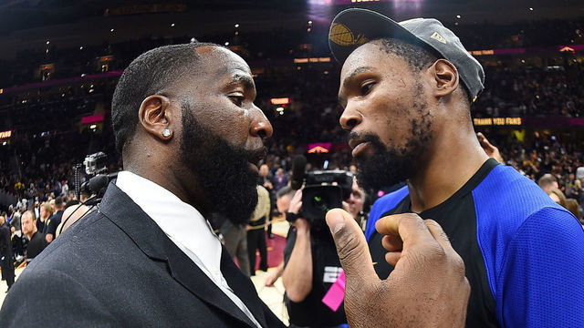 CLEVELAND, OH - JUNE 8: Kevin Durant #35 of the Golden State Warriors and Kendrick Perkins #21 of the Cleveland Cavaliers hug after Game Four of the 2018 NBA Finals on June 8, 2018 at Quicken Loans Arena in Cleveland, Ohio. Mandatory Copyright Notice: Copyright 2018 NBAE