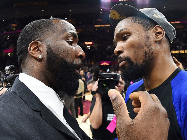 CLEVELAND, OH - JUNE 8: Kevin Durant #35 of the Golden State Warriors and Kendrick Perkins #21 of the Cleveland Cavaliers hug after Game Four of the 2018 NBA Finals on June 8, 2018 at Quicken Loans Arena in Cleveland, Ohio. Mandatory Copyright Notice: Copyright 2018 NBAE