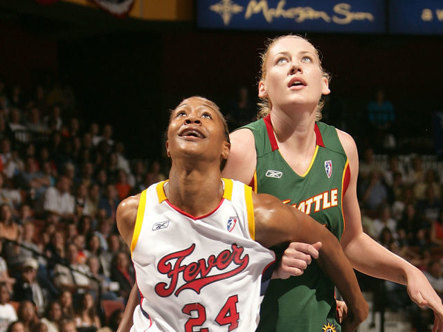 UNCASVILLE, CT - JULY 9: Tamika Catchings #24 of the Eastern Conference All-Stars boxes out against Lauren Jackson #15 of the Western Conference All-Stars during the 2005 WNBA All-Star Game on July 9, 2005 at Mohegan Sun Arena in Uncasville, Connecticut. NOTE TO USER: User expressly acknowledges and agrees that, by downloading and/or using this Photograph, user is consenting to the terms and conditions of the Getty Images License Agreement. Mandatory Copyright Notice: Copyright 2005 NBAE
