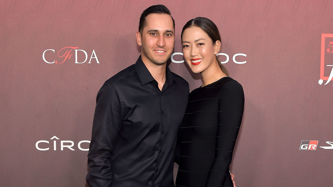 HOLLYWOOD, CALIFORNIA - JULY 18: Jonnie West and Michelle Wie attend Sports Illustrated Fashionable 50 2019 at Sunset Room Hollywood on July 18, 2019 in Hollywood, California.