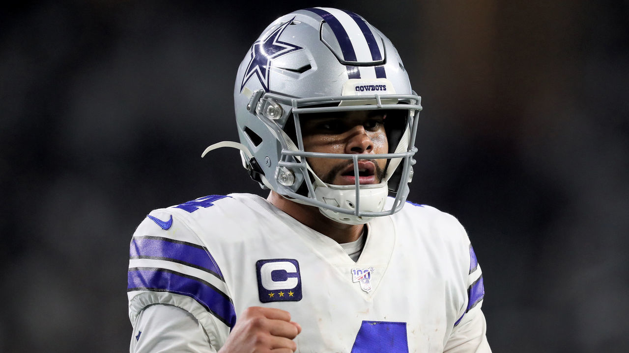 ARLINGTON, TEXAS - DECEMBER 29: Dak Prescott #4 of the Dallas Cowboys celebrates in the third quarter against the Washington Redskins in the game at AT&T Stadium on December 29, 2019 in Arlington, Texas.