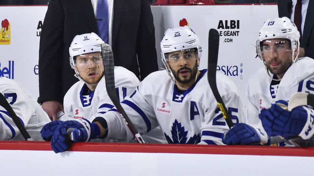 LAVAL, QC - DECEMBER 28: Head coach of the Toronto Marlies Greg Moore looks on from behind the bench against the Laval Rocket during the first period at Place Bell on December 28, 2019 in Laval, Canada. The Laval Rocket defeated the Toronto Marlies 6-1.