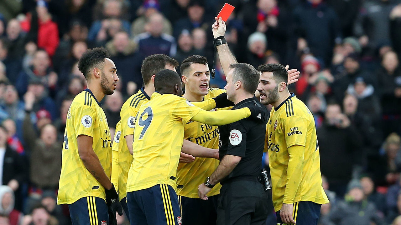 LONDON, ENGLAND - JANUARY 11: Referee Paul Tierney shows Pierre-Emerick Aubameyang of Arsenal a red card after VAR converts the original yellow card during the Premier League match between Crystal Palace and Arsenal FC at Selhurst Park on January 11, 2020 in London, United Kingdom.