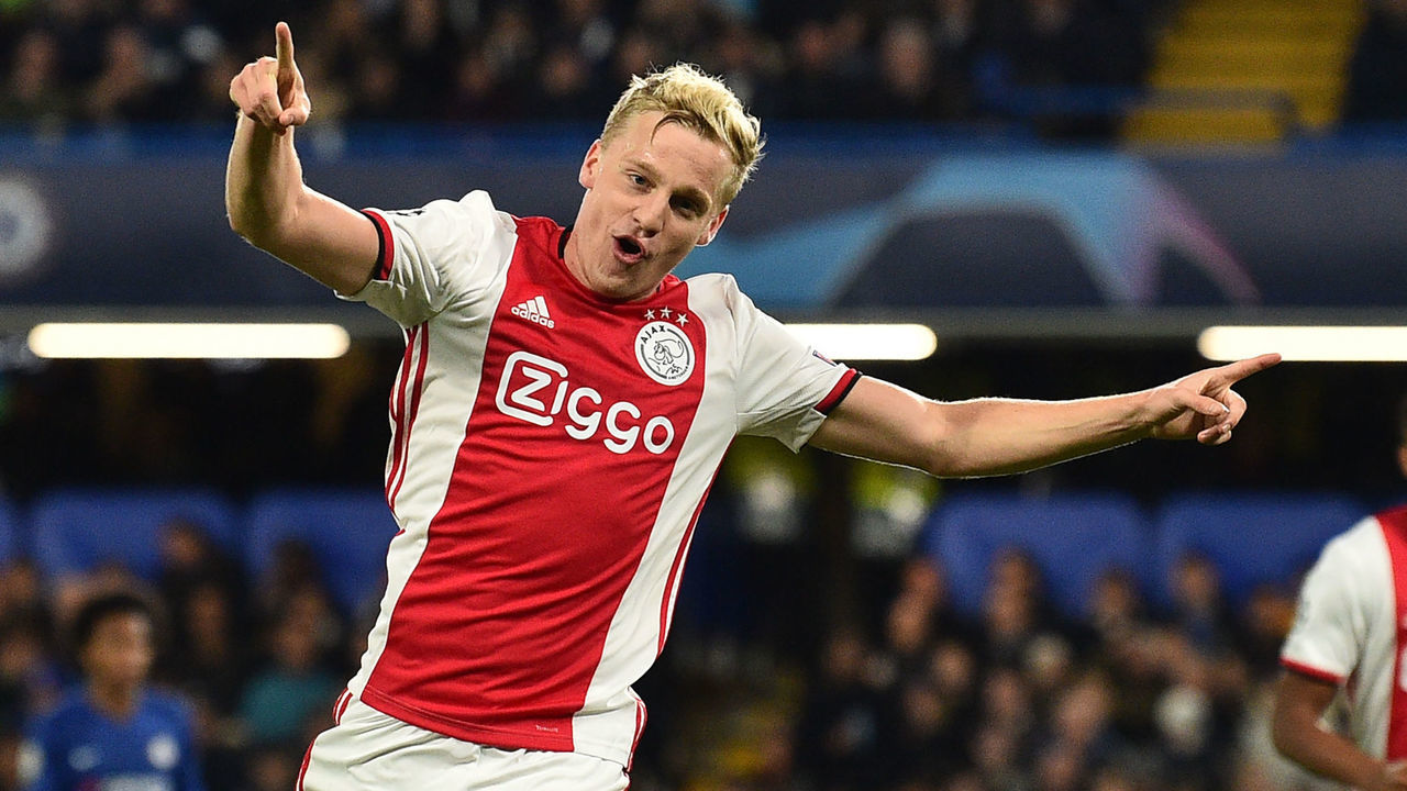 Ajax's Dutch midfielder Donny Van de Beek celebrates after scoring their fourth goal during the UEFA Champion's League Group H football match between Chelsea and Ajax at Stamford Bridge in London on November 5, 2019.