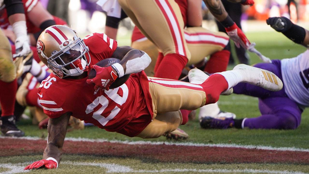 SANTA CLARA, CALIFORNIA - JANUARY 11: Tevin Coleman #26 of the San Francisco 49ers dives for a touchdown against the Minnesota Vikings in the second quarter of the NFC Divisional Round Playoff game at Levi's Stadium on January 11, 2020 in Santa Clara, California.