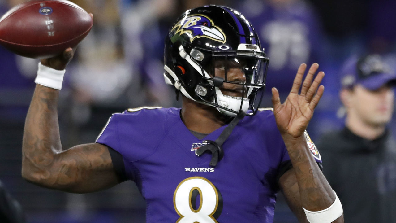 BALTIMORE, MARYLAND - JANUARY 11: Quarterback Lamar Jackson #8 of the Baltimore Ravens warms up before the AFC Divisional Playoff game against the Tennessee Titans at M&T Bank Stadium on January 11, 2020 in Baltimore, Maryland.