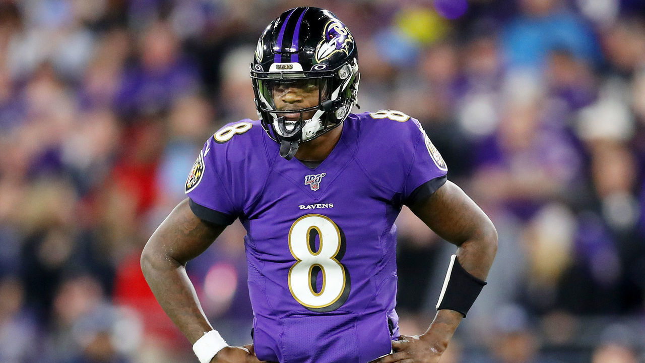 BALTIMORE, MARYLAND - JANUARY 11: Lamar Jackson #8 of the Baltimore Ravens reacts during the first half against the Tennessee Titans in the AFC Divisional Playoff game at M&T Bank Stadium on January 11, 2020 in Baltimore, Maryland.