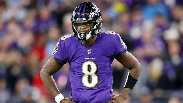 BALTIMORE, MARYLAND - JANUARY 11: Lamar Jackson #8 of the Baltimore Ravens reacts during the first half against the Tennessee Titans in the AFC Divisional Playoff game at M&T Bank Stadium on January 11, 2020 in Baltimore, Maryland.