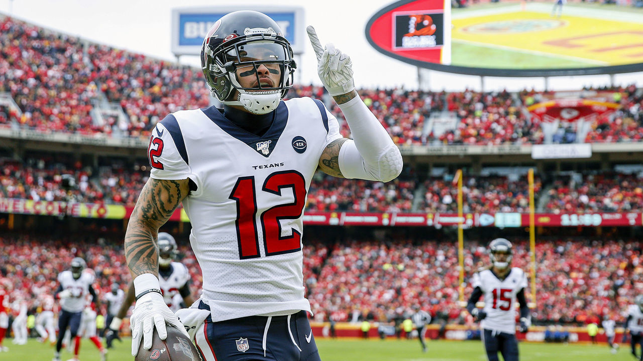 KANSAS CITY, MISSOURI - JANUARY 12: Kenny Stills #12 of the Houston Texans celebrates his 54-yard touchdown reception during the first quarter against the Kansas City Chiefs in the AFC Divisional playoff game at Arrowhead Stadium on January 12, 2020 in Kansas City, Missouri.