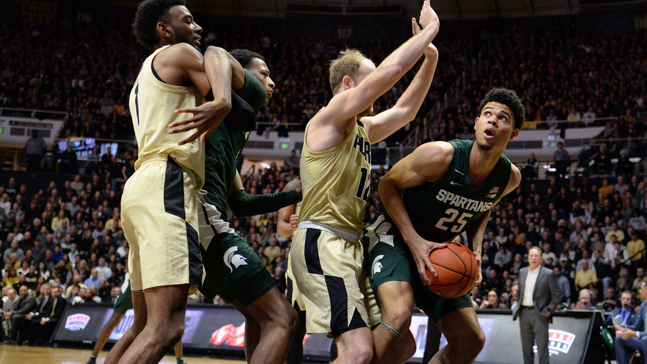 WEST LAFAYETTE, IN - JANUARY 12: Michigan State Spartans forward Marcus Bingham Jr. (30) boxes out Purdue Boilermakers forward Aaron Wheeler (1) as Michigan State Spartans forward Malik Hall (25) attempts to shoot the ball over Purdue Boilermakers forward Evan Boudreaux (12) during the Big Ten Conference college basketball game between the Michigan State Spartans and the Purdue Boilermakers on January 12, 2020, at Mackey Arena in West Lafayette, Indiana.