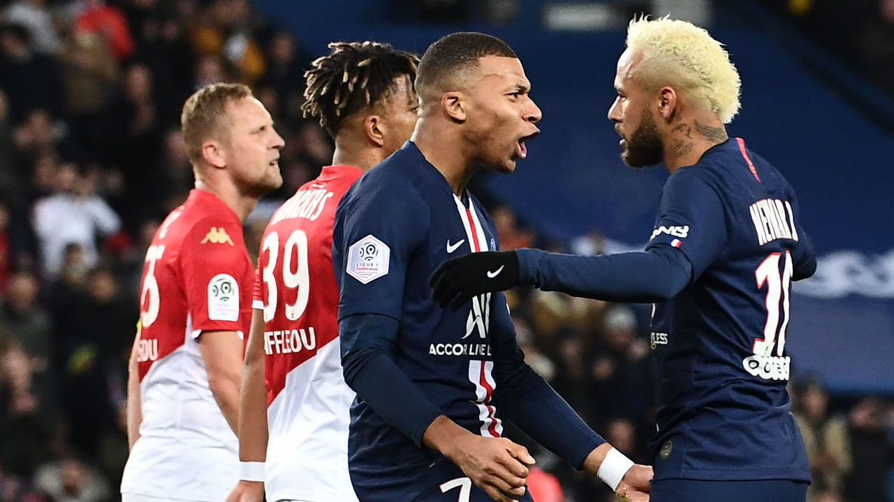 Paris Saint-Germain's Brazilian forward Neymar (R) is congratulated by Paris Saint-Germain's French forward Kylian Mbappe after scoring a goal during the French L1 football match between Paris Saint-Germain and AS Monaco at the Parc des Princes stadium in Paris on January 12, 2020.
