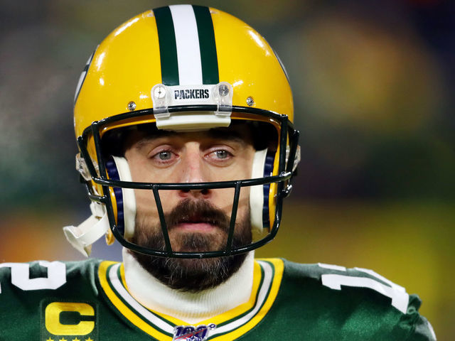 GREEN BAY, WISCONSIN - JANUARY 12: Aaron Rodgers #12 of the Green Bay Packers looks on before the NFC Divisional Playoff game against the Seattle Seahawks at Lambeau Field on January 12, 2020 in Green Bay, Wisconsin.