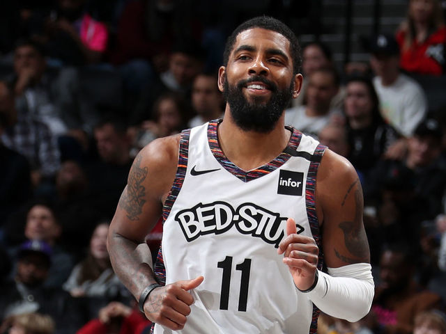 BROOKLYN, NY - JANUARY 12: Kyrie Irving #11 of the Brooklyn Nets smiles during the game against the Atlanta Hawks on January 12, 2020 at Barclays Center in Brooklyn, New York. Mandatory Copyright Notice: Copyright 2020 NBAE
