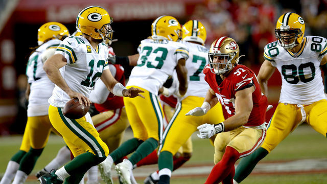 SANTA CLARA, CA - NOVEMBER 24: Nick Bosa #97 of the San Francisco 49ers pressures Aaron Rodgers #12 of the Green Bay Packers during the game at Levi's Stadium on November 24, 2019 in Santa Clara, California. The 49ers defeated the Packers 37-8.