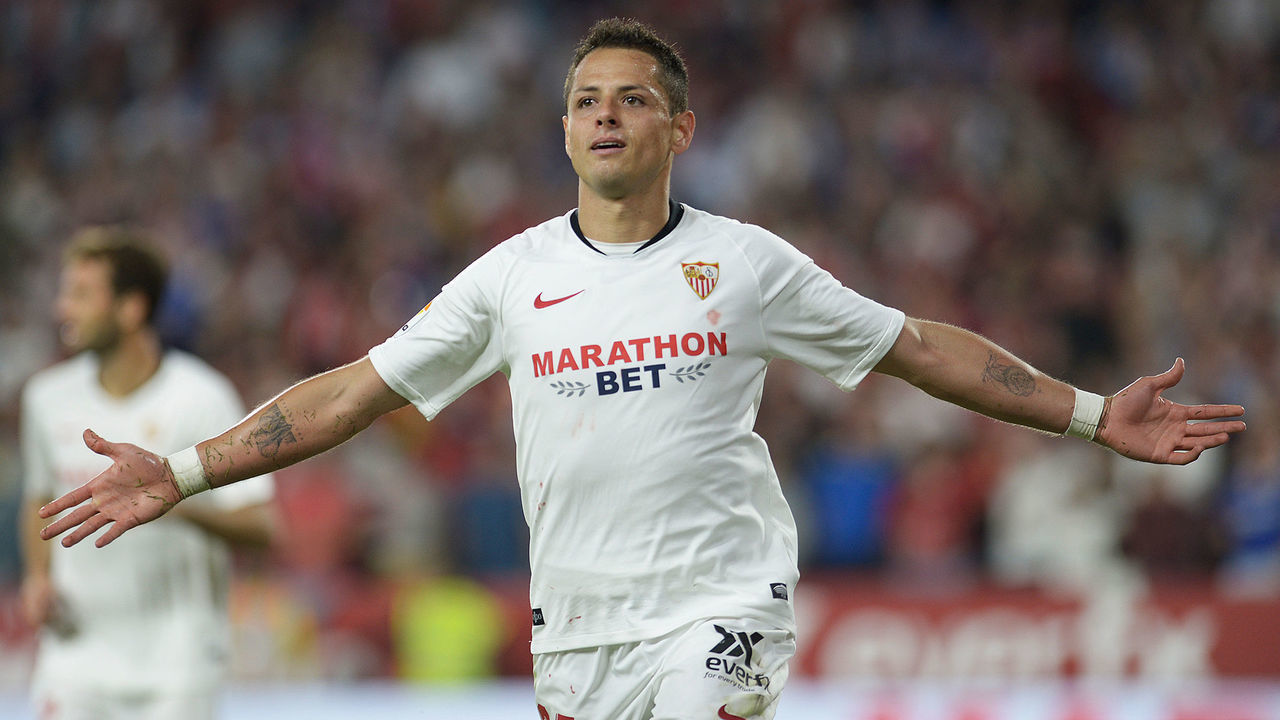 Sevilla's Mexican forward Chicharito celebrates after scoring a goal during the Spanish league football match between Sevilla FC and Getafe CF at the Ramon Sanchez Pizjuan stadium in Seville on October 27, 2019.