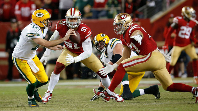 SANTA CLARA, CA - NOVEMBER 24: Arik Armstead #91 and Nick Bosa #97 of the San Francisco 49ers pressures Aaron Rodgers #12 of the Green Bay Packers during the game at Levi's Stadium on November 24, 2019 in Santa Clara, California. The 49ers defeated the Packers 37-8.