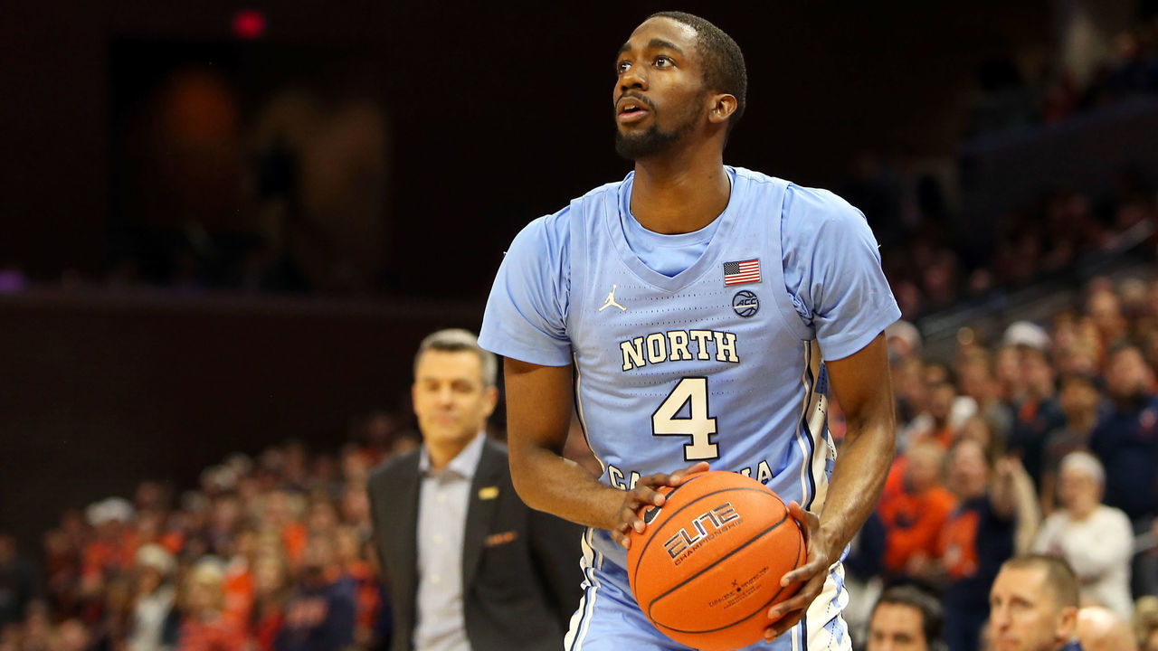 CHARLOTTESVILLE, VA - DECEMBER 07: Brandon Robinson #4 of the North Carolina Tar Heels shoots in the first half during a game against the Virginia Cavaliers at John Paul Jones Arena on December 7, 2019 in Charlottesville, Virginia.