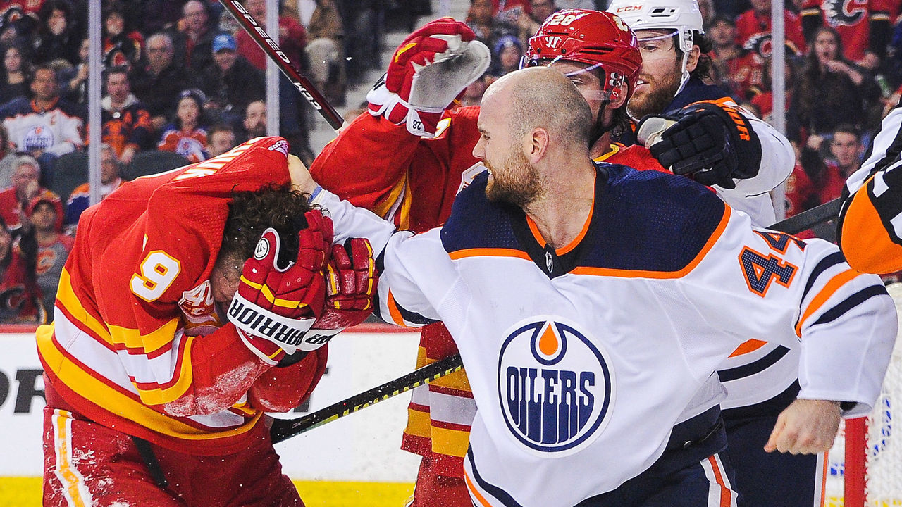 CALGARY, AB - JANUARY 11: Zack Kassian #44 of the Edmonton Oilers fights Matthew Tkachuk #19 of the Calgary Flames during an NHL game at Scotiabank Saddledome on January 11, 2020 in Calgary, Alberta, Canada.