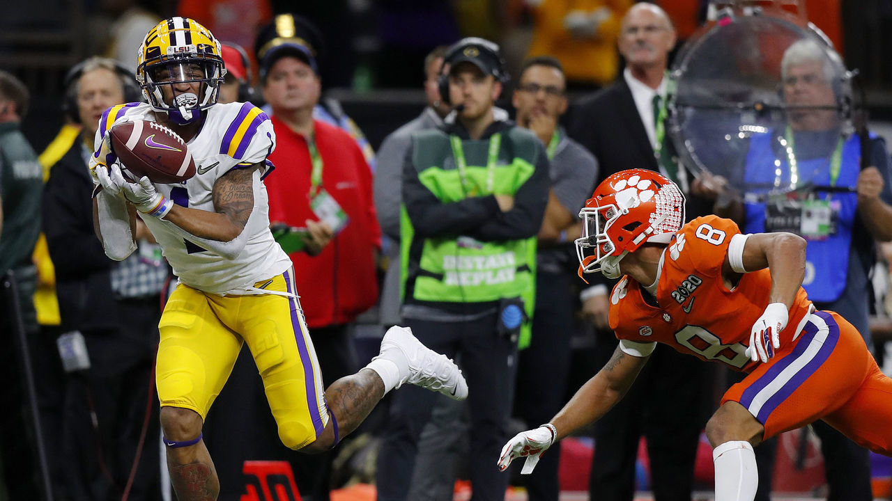 NEW ORLEANS, LOUISIANA - JANUARY 13: Ja'Marr Chase #1 of the LSU Tigers catches the ball for a 52 yard touchdown against the Clemson Tigers in the College Football Playoff National Championship game at Mercedes Benz Superdome on January 13, 2020 in New Orleans, Louisiana.